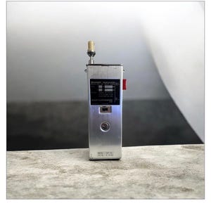 May include: A vintage silver Sharp transceiver with a small antenna and a red button. The device has a black label with white text and a circular button on the front. The model number is CAT-100.