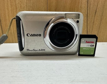 Canon Powershot A495 Digital Camera Compact 10 MP 3.3 X Optical Zoom + 1GB Memory card and handstrap
