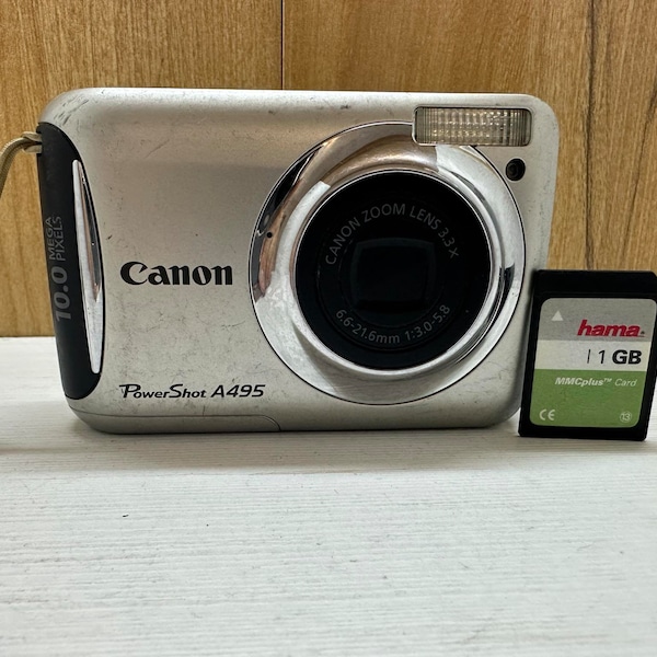 Canon Powershot A495 Digital Camera Compact 10 MP 3.3 X Optical Zoom + 1GB Memory card and handstrap