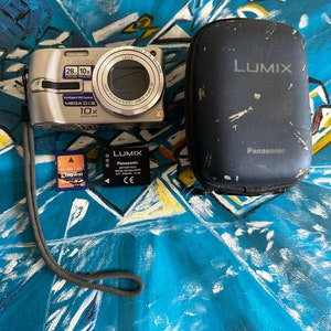 Panasonic Lumix DMC-TZ3 Digital Camera Leica Made in Japan 10X Optical Zoom 7.2MP 3 inches Lcd 512n Mb Memory card, battery and Case image 1