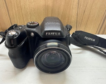 Fujifilm FinePix S2000 HD Movie Digital Camera 10 MP 15X Wide Optical Zoom  Dual Image Stabilization Compact