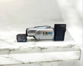 Manuel d’utilisation caméscope numérique PV-GS320