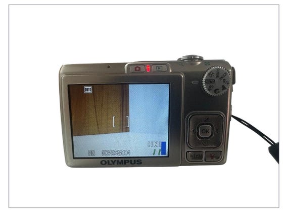 Olympus X-790 Digital Camera Ultracompact 7.1 MP 3x Optical Zoom