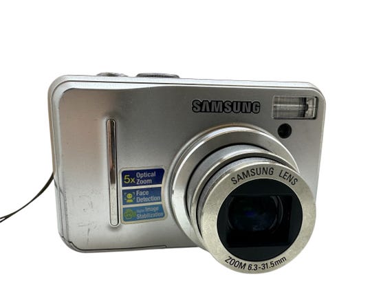 Samsung S1060 Digital Camera Compact 10.2. MP 5x Optical Zoom 2.7
