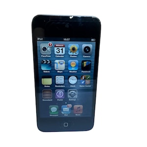 May include: A black iPod touch with a rectangular touchscreen display showing the iOS home screen with various app icons including FaceTime, Calendar, Photos, Camera, Videos, Maps, Weather, Passbook, Notes, Reminders, Clock, Game Center, Newsstand, iTunes, Settings, Messages, Mail, and Music.