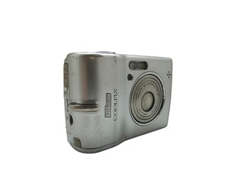 Buy Nikon Coolpix L12 Digital Camera 7 MP 3x Optical Zoom LCD Face