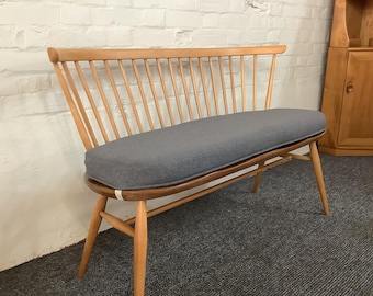 Ercol Windsor 450 Loveseat, produced 1960s onwards.