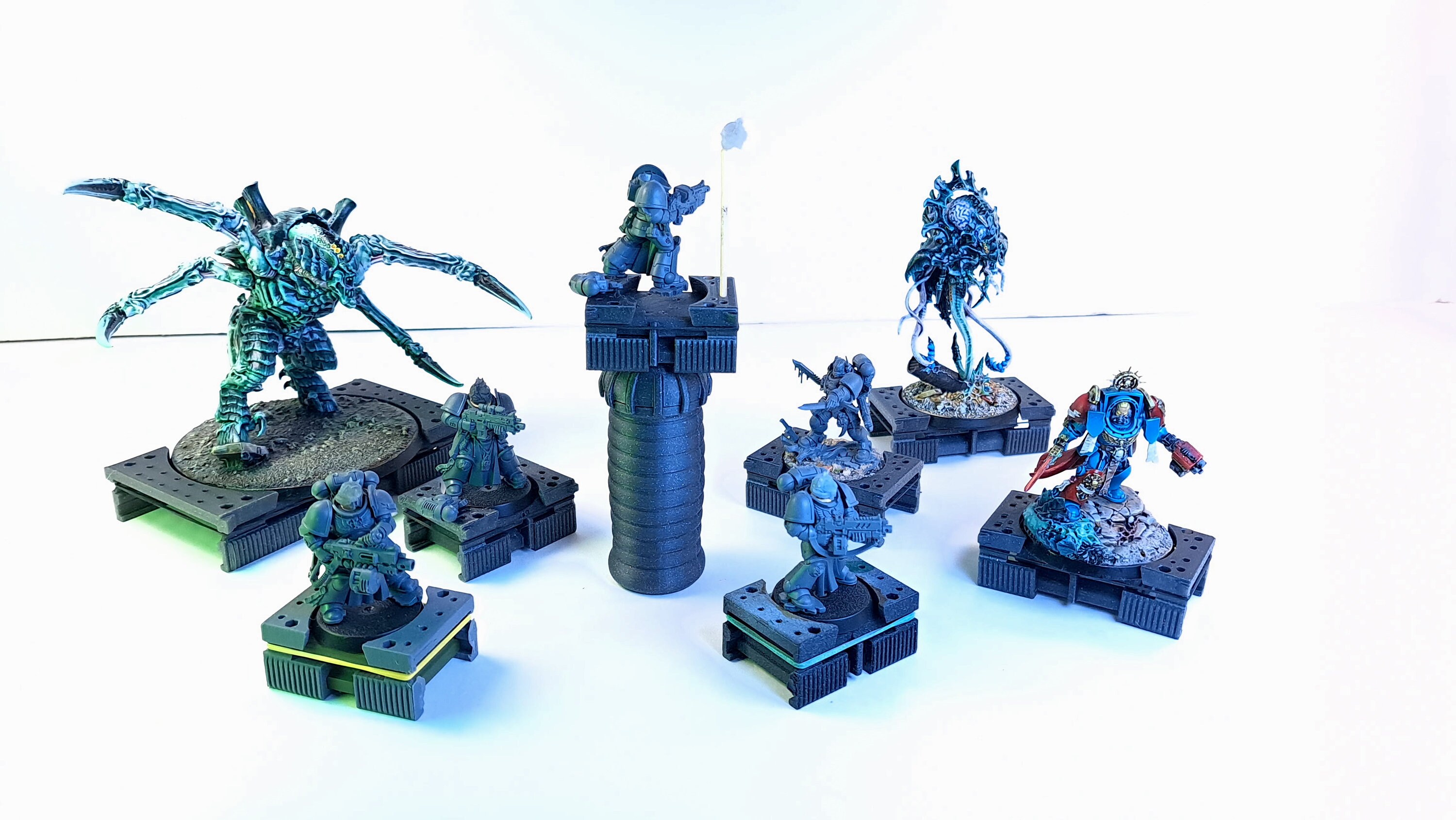 Greyzzly: The Ultimate Miniature Painting Handle with 360 Rotating and modular base.