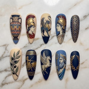 May include: A set of ten almond-shaped press-on nails featuring detailed hand-painted designs inspired by ancient Greek art. The collection includes motifs of amphorae, warriors in helmets, mythical creatures, chariots, Pegasus, and laurel wreaths.