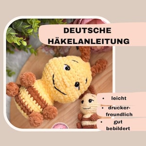 May include: A crochet pattern for a cute bee amigurumi toy. The pattern is written in German and includes detailed instructions and photos. The pattern is described as easy to follow and beginner friendly.