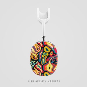 Pu&ograve; includere: Un supporto per cuffie bianco con un design astratto colorato sulle cuffie. Il design presenta vortici di giallo, rosso, blu e verde.
