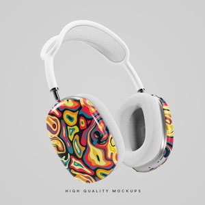 Pu&ograve; includere: Cuffie wireless bianche con un motivo astratto colorato su un padiglione. Le cuffie hanno un'archetto e padiglioni bianchi.