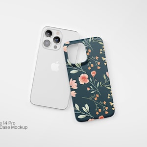 Könnte beinhalten: Ein weißes iPhone 14 Pro mit einer floralen Handyhülle. Die Hülle hat einen dunkelblauen Hintergrund mit rosa und orangefarbenen Blumen.