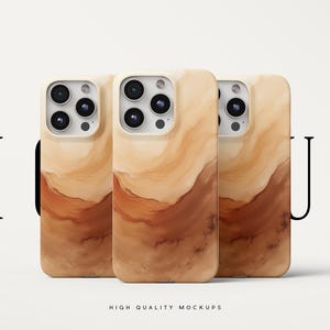 以下が含まれることがあります： 木目模様の携帯電話ケースが3つあります。ケースは白で、茶色とベージュの木目模様になっています。ケースは左から右へ並べてあり、左端のケースは他の2つのケースより少し前に出ています。