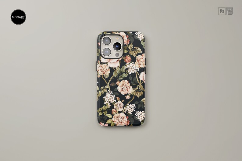 May include: A black phone case with a floral pattern featuring pink and white roses, green leaves, and white flowers. The case has a cutout for the phone's camera.
