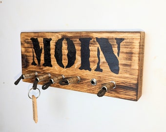 Schlüsselbrett aus Holz mit Klinkensteckern -"Moin" 6er - schwarz