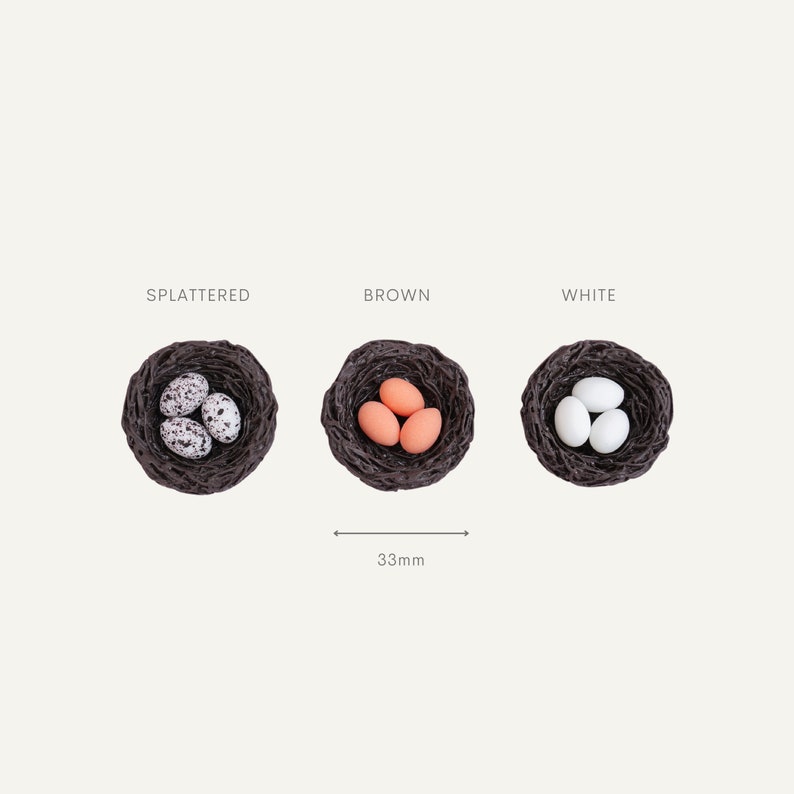 May include: Three small nests, each containing three eggs. The nests are made of woven twigs and are 3.3 inches in diameter. The eggs in the first nest are speckled brown and white. The eggs in the second nest are light orange. The eggs in the third nest are white.