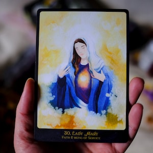 May include: A watercolor illustration of Lady Mary on a card with a black border. The card has the text "30. Lady Mary" and "Faith & Being of Service".