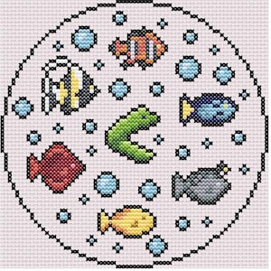 May include: Cross-stitch design featuring various colorful fish and bubbles within a circular frame. The fish include a clownfish, a yellow fish, a blue fish, a red fish, and a green eel-like creature. The background is a light pink fabric.