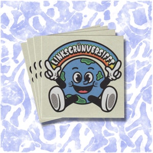 May include: A stack of stickers featuring a cartoon earth with a rainbow arc above it that says "Linksgrünversifft".