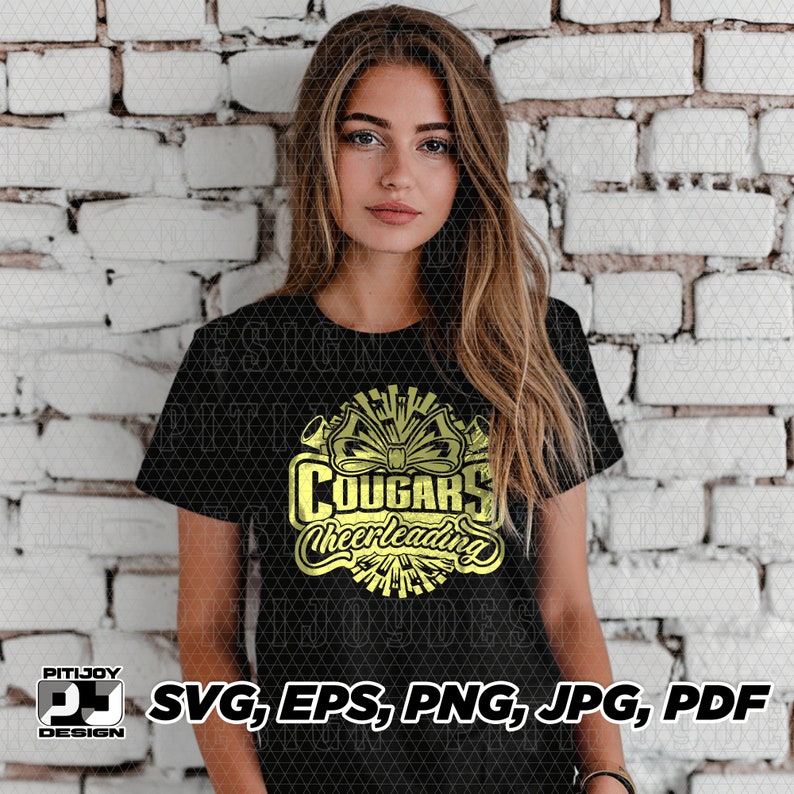 May include: A black t-shirt with a gold graphic design that says "Cougar Cheerleading" with a stylized image of a cheerleader's pom-poms.