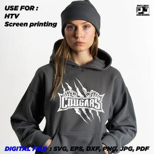 May include: A gray hoodie with a white graphic of a claw mark with the word "COUGARS" inside. The text "USE FOR: HTV Screen printing" is at the top of the image. The text "DIGITAL FILE: SVG, EPS, DXF, PNG, JPG, PDF" is at the bottom of the image.