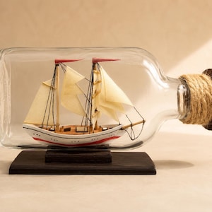 Mini barco en botella, 100 ml – Regalo náutico artesanal