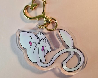 Llavero acrílico de Pokémon Mew shiny: adorable llavero de anime | Charm de doble cara de 6,35 cm | Regalo para gamers, fans del anime y coleccionistas