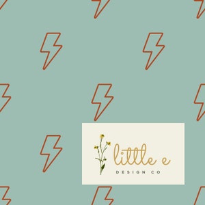 May include: A seamless pattern featuring a repeating design of orange lightning bolts on a light blue background. The pattern includes a small logo in the center with a floral design and the text "little e DESIGN CO".