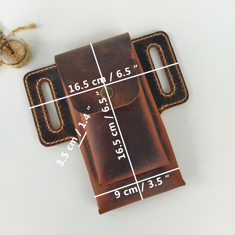 May include: A brown leather knife sheath with a belt loop. The sheath measures 6.5 inches by 3.5 inches and has a flap that secures with a snap.