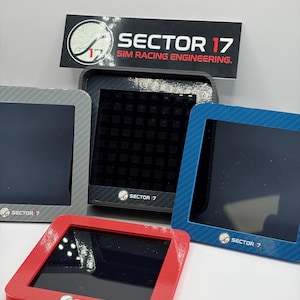 May include: A collection of sim racing engineering displays in various colors: red, blue, gray, and black. Each display has a square screen and a frame with the "Sector 17" logo. The displays are designed for sim racing.