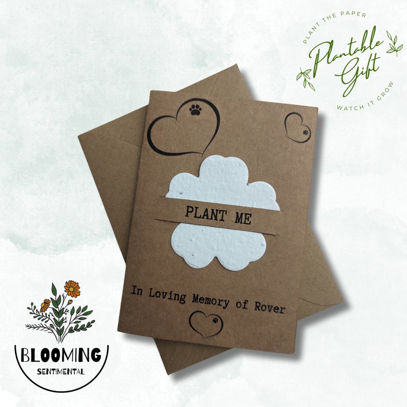 May include: A brown card with a white flower-shaped seed paper that says "PLANT ME" and "In Loving Memory of Rover". The card is part of a plantable gift set with a brown envelope and a green logo that says "Plantable Gift".