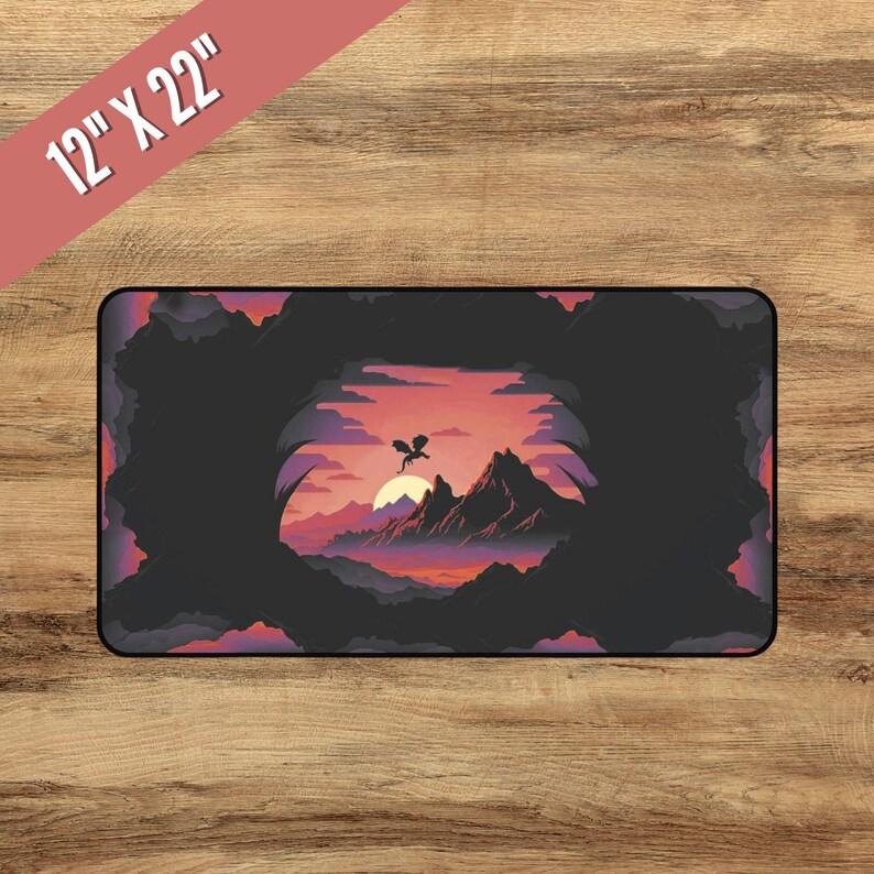 May include: A black and purple fantasy landscape with a silhouette of a dragon flying over a mountain range at sunset. The scene is framed by a dark, shadowy cave opening. The image is 12 inches by 22 inches.
