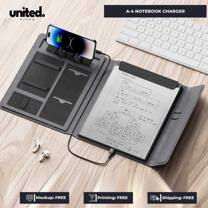 May include: A gray A-4 notebook charger with a smartphone charging on top. The notebook has a built-in phone stand, multiple pockets, and a notepad with handwritten notes. The text "A-4 NOTEBOOK CHARGER" is visible.