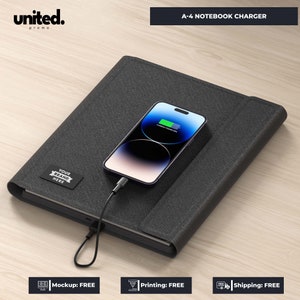 May include: A black A-4 notebook charger with a smartphone charging on top. The phone screen displays a charging icon. The notebook has a textured surface and a small label that says "YOUR BRAND HERE". The top left corner has the "united. promo" logo.