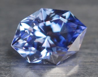 Made to order Czochralski sapphire. Light cornflower blue periwinkle blue synthetic, wide marquise shape. Approx 1.3 ct, 8 x 6 mm
