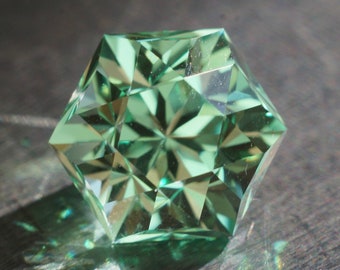 Made to order. ‘Ruffled Feathers’ hexagon design. ~3ct lab  sapphire. Light green, minty seafoam green synthetic . ~8 mm flat to flat