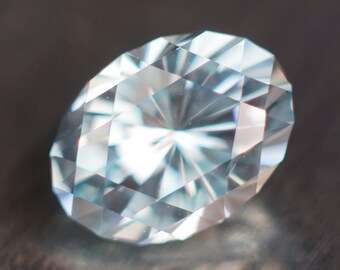 3.5 ct MADE TO ORDER Czochralski sapphire. Light aqua blue synthetic, oval shape hexagon design ~10 x 7.5 mm. Art Deco look