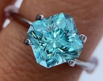 4-5 carat, 7-8mm Paraiba Yb:YAG. Custom cut, made to order. Synthetic garnet loose stone. Precision cut cushion design.