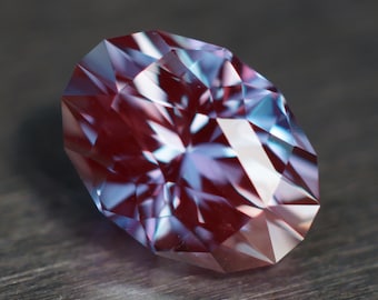 5.12 ct synthetic alexandrite. Light saturation Czochralski material made for laser rods. 11.74 x 8.54 mm oval in my ‘Glitter Queen’ design