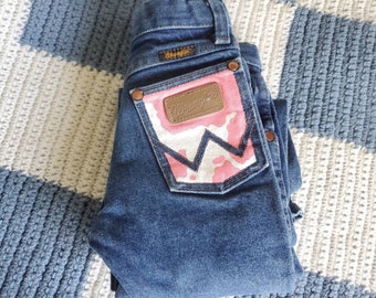 Hand Painted Pink Cow Print Wrangler Jeans