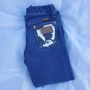 Hand Painted Cow Print Wrangler Jeans