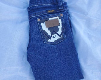 Hand Painted Cow Print Wrangler Jeans