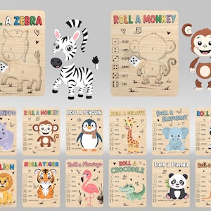 Peut inclure: Planches de jeu en bois sur le thème des animaux, avec des titres tels que "Roll a Zebra" et "Roll a Monkey". Chaque planche propose un jeu de dés avec des parties d'animaux. Les animaux incluent un zèbre, un singe, et plus encore.