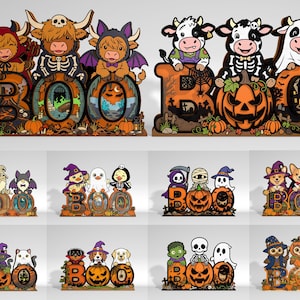 Puede incluir: Una colección de letreros decorativos de madera con la palabra BOO, ilustrados con varios personajes de dibujos animados con disfraces de Halloween, incluyendo vacas, perros, gatos y fantasmas, sobre fondos naranjas y negros.