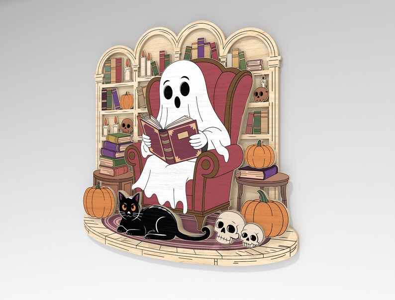 May include: A wooden Halloween-themed decoration featuring a ghost reading a book in a red armchair. A black cat, pumpkins, and skulls are also present. The background includes a bookshelf with books and candles.
