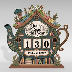 May include: A wooden book counter shaped like a teapot, displaying "Books Read this Year" and the number "130". It features a colourful roof, a bookshelf, and the text "Jessica's Library". The teapot is teal with brown and green details.