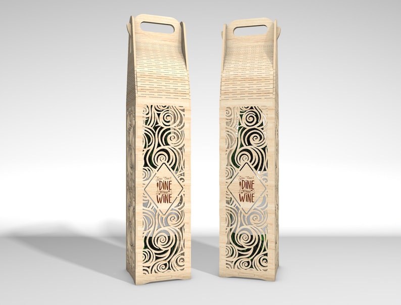 May include: Two wooden wine bottle carriers with a handle, featuring a decorative swirl design and the text "Dine Without Wine". The carriers are made of light-colored wood and have a rectangular shape.