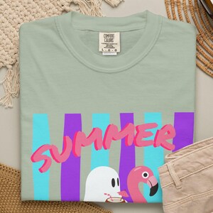 Vintage Summerween Top featuring playful ghosts enjoying the spooky summer season. This comfortable garment-dyed Comfort Colors tee has a soft, lived-in appearance and relaxed fit, making it a fun choice for Halloween in July events, summer outings, and casual seasonal outfits.