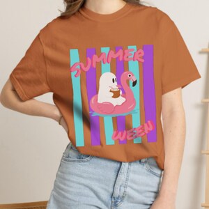Summerween Shirt featuring playful ghost artwork for a fun and slightly spooky warm-weather look. The premium Comfort Colors fabric, relaxed fit, and vintage garment-dyed appearance make this T-shirt a cozy option for summer outings, Halloween events, vacations, and casual weekends.